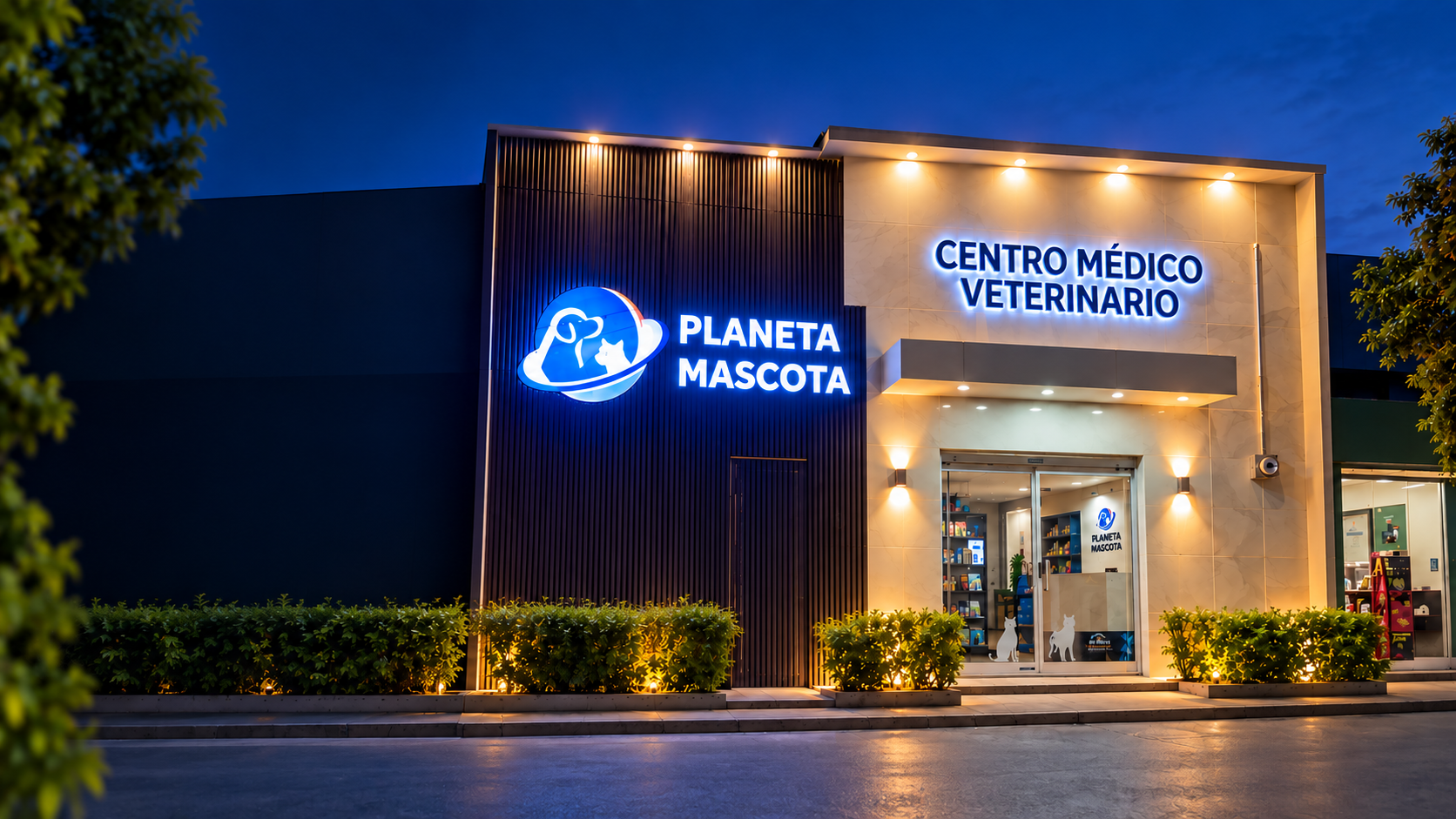 Fachada iluminada del Centro Médico Veterinario Planeta Mascota